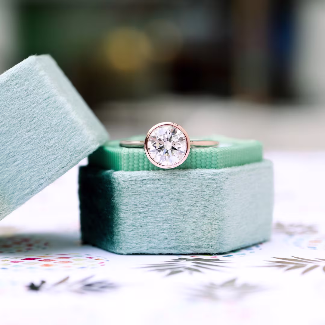 14k Rose Gold 1.5 ct Round Bezel Set Lab Created Diamond Solitaire Engagement Ring Ada Diamonds Design AD-148 Artistic Image