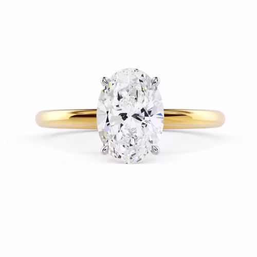 Yellow Gold Oval Petite Four Prong Solitaire featuring Man Made Diamonds (Main View)