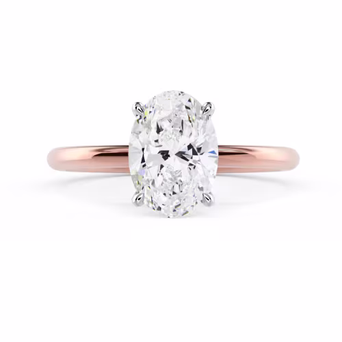 High Quality Man Made Diamonds set in Rose Gold Oval Classic Four Prong Solitaire Diamond Engagement Ring (Main View)
