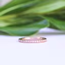 Manmade Diamond Channel Set Half Wedding Band In Rose Gold AD084