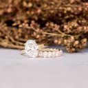 yellow gold 3.5 carat oval lab diamond solitaire engagement ring and oval cut lab diamond eternity band ada diamonds design ad 193 and ad 143