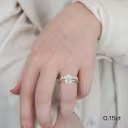 pear solitaire engagement ring with oval wedding band in yellow gold featuring lab diamonds ada diamonds design ad 187 and ad 193 on model
