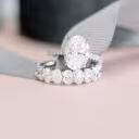 oval lab diamond wedding set with 4ct oval eternity band and oval pavé engagement ring platinum
