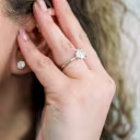 profile view of platinum two carat round brilliant classic solitaire engagement ring with man made diamonds ada diamonds design ad 144 on model