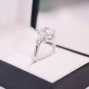 Diamonds set in Cushion and Trillion Diamond Engagement Ring (Profile View)