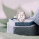 oval in double sided halo setting in platinum