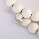 platinum and yellow gold 3ct emerald cut and baguette lab grown diamond three stone ring ada diamonds design ad 464 macro