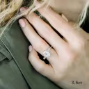 platinum four carat emerald cut and baguette three stone lab created diamond engagement ring on model ada diamonds design ad 464 d