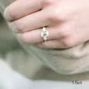 yellow gold 2 carat emerald cut and pear three stone lab diamond ring on model ada diamonds design ad467