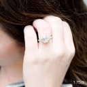 white gold three stone pave ring with 1.75ct lab grown emerald cut diamonds