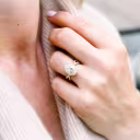 18k Yellow Gold 3 Carat Pear Lab Diamond Halo Engagement Ring with Twisting Diamond Band Ada Diamonds Design AD-179 on Model