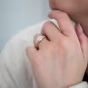 on model profile view of 2.5ct pear three stone lab diamond engagement ring ada diamonds design ad 218 on model