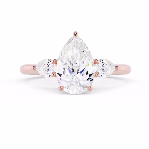 Diamonds set in Rose Gold Pear Three Stone Diamond Engagement Ring (Main View)