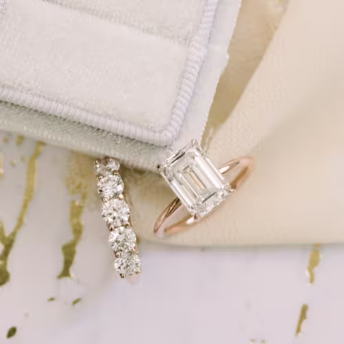 14k Rose Gold Lab Diamond Wedding Set with 4ct Emerald Cut Lab Diamond Solitaire and 1.5ct Round Five Stone Lab Diamond Wedding Band Ada Diamonds Design AD-235 and AD-247 Macro