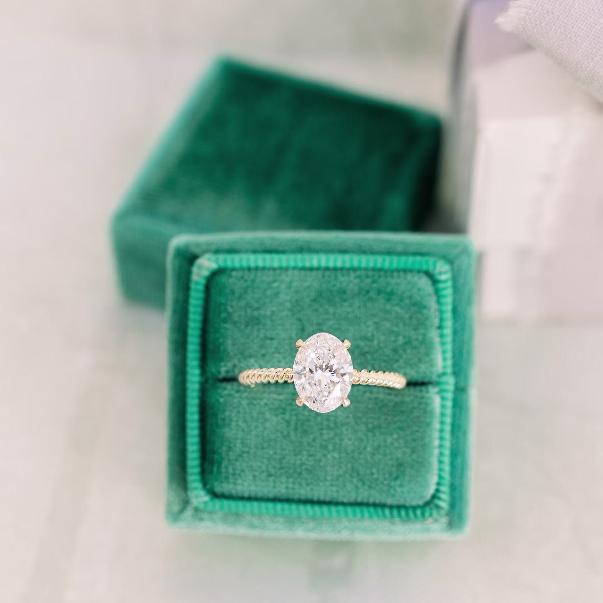 14k Yellow Gold 1.75ct Oval Lab Diamond Solitaire Engagement Ring with Twisting Band Ada Diamonds Design AD-177 Macro