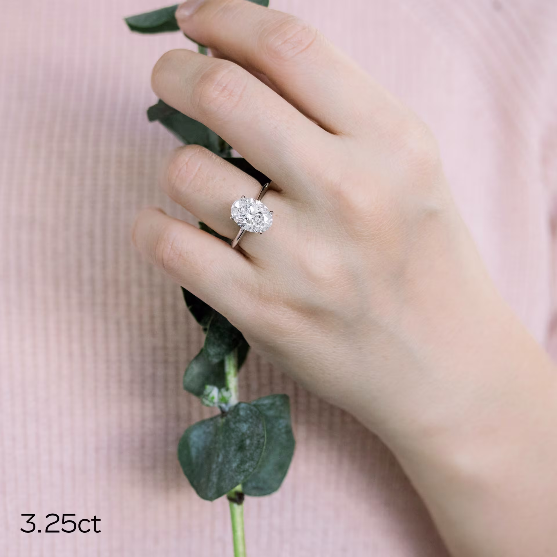 Platinum Oval Petite Four Prong Solitaire Diamond Engagement Ring featuring 3.25 ctw Man Made Diamonds (Main View)