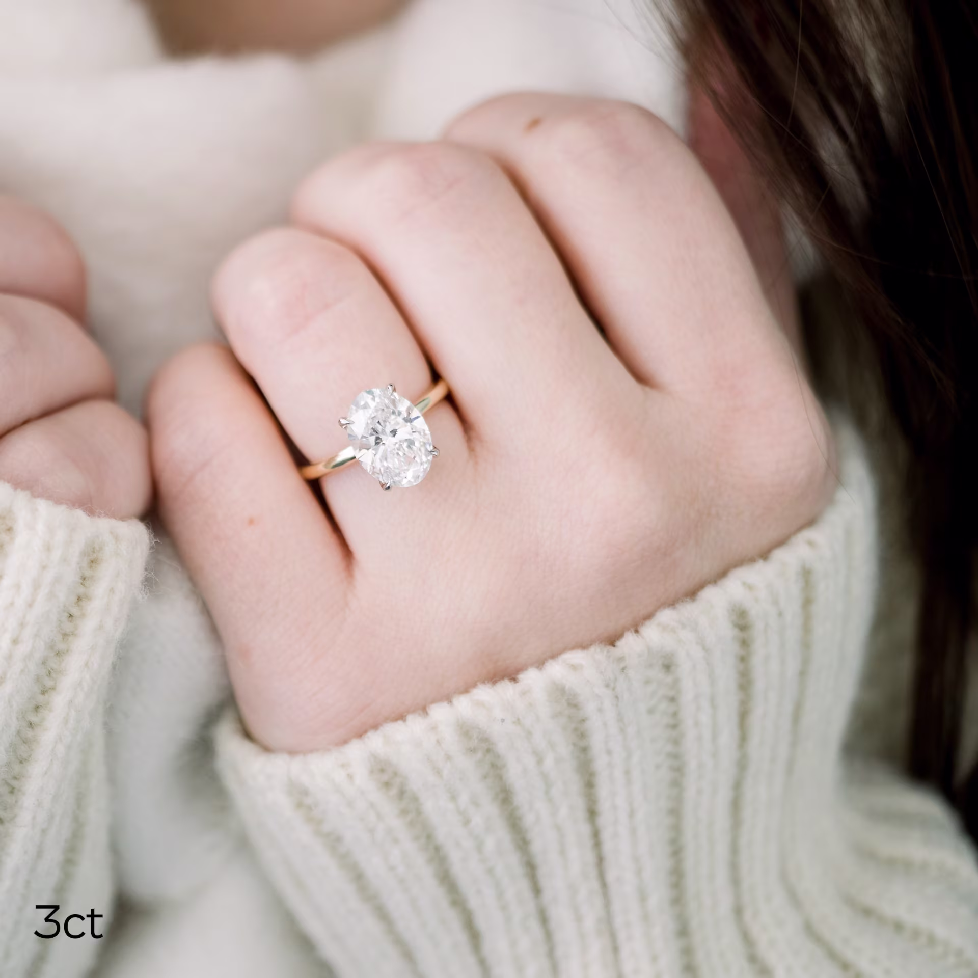 Platinum & 14k Yellow Gold Oval Classic Four Prong Solitaire featuring 3.0 ct Man Made Diamonds (Side View)