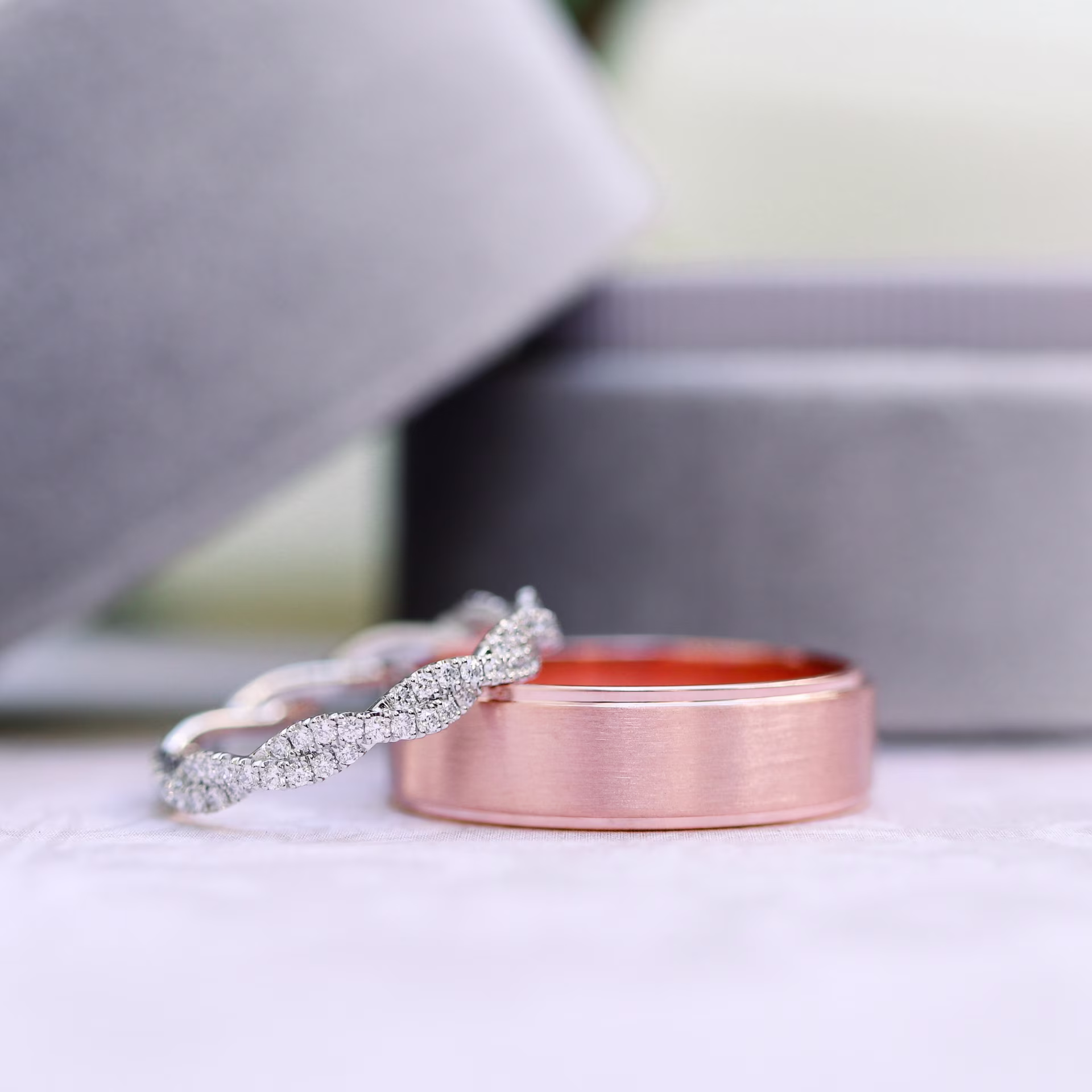 Matte Beveled Mens Wedding Band In Rose Gold With Twisting Eternity Band Design AD169