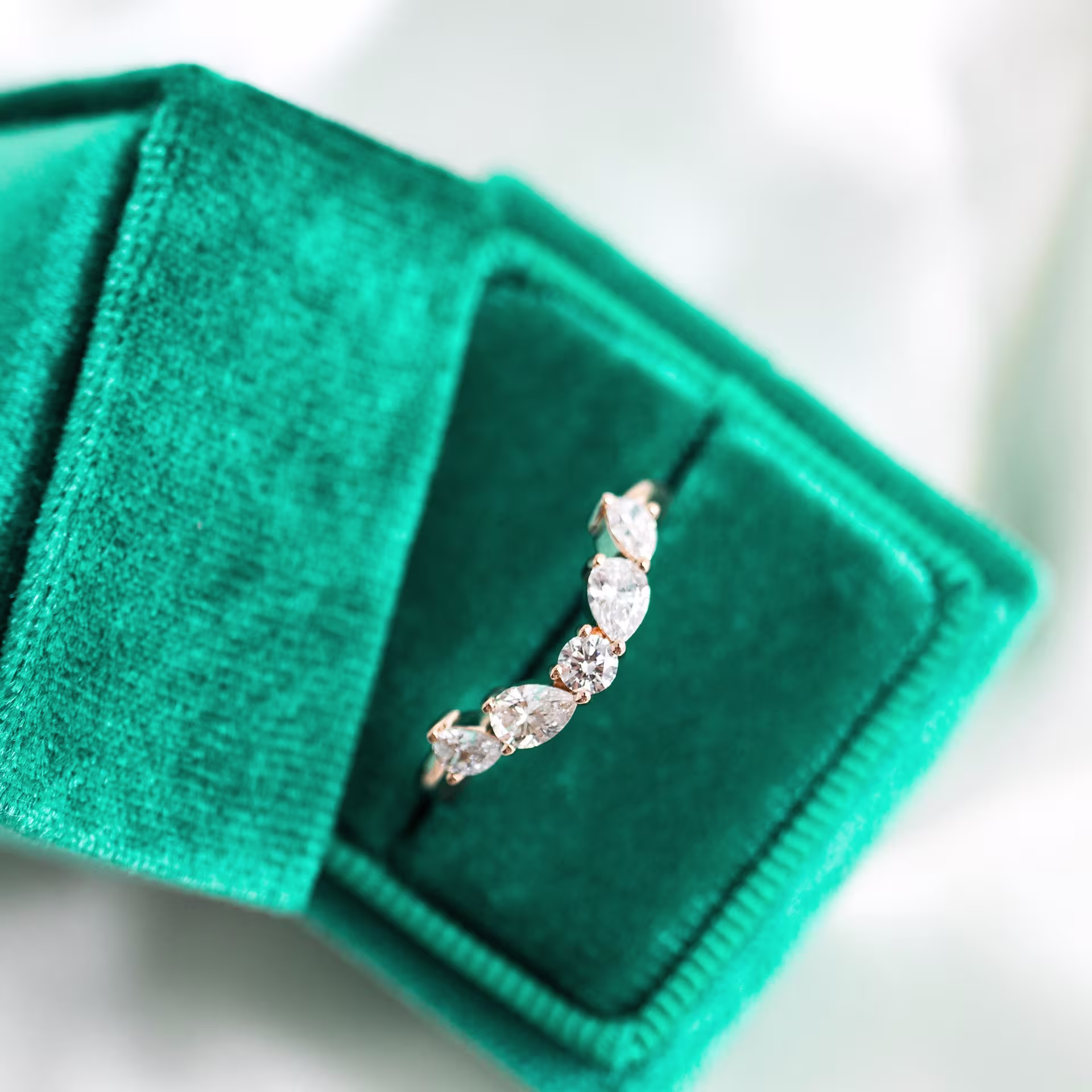 18k rose gold round and pear lab diamond half eternity band ada diamonds design ad 182