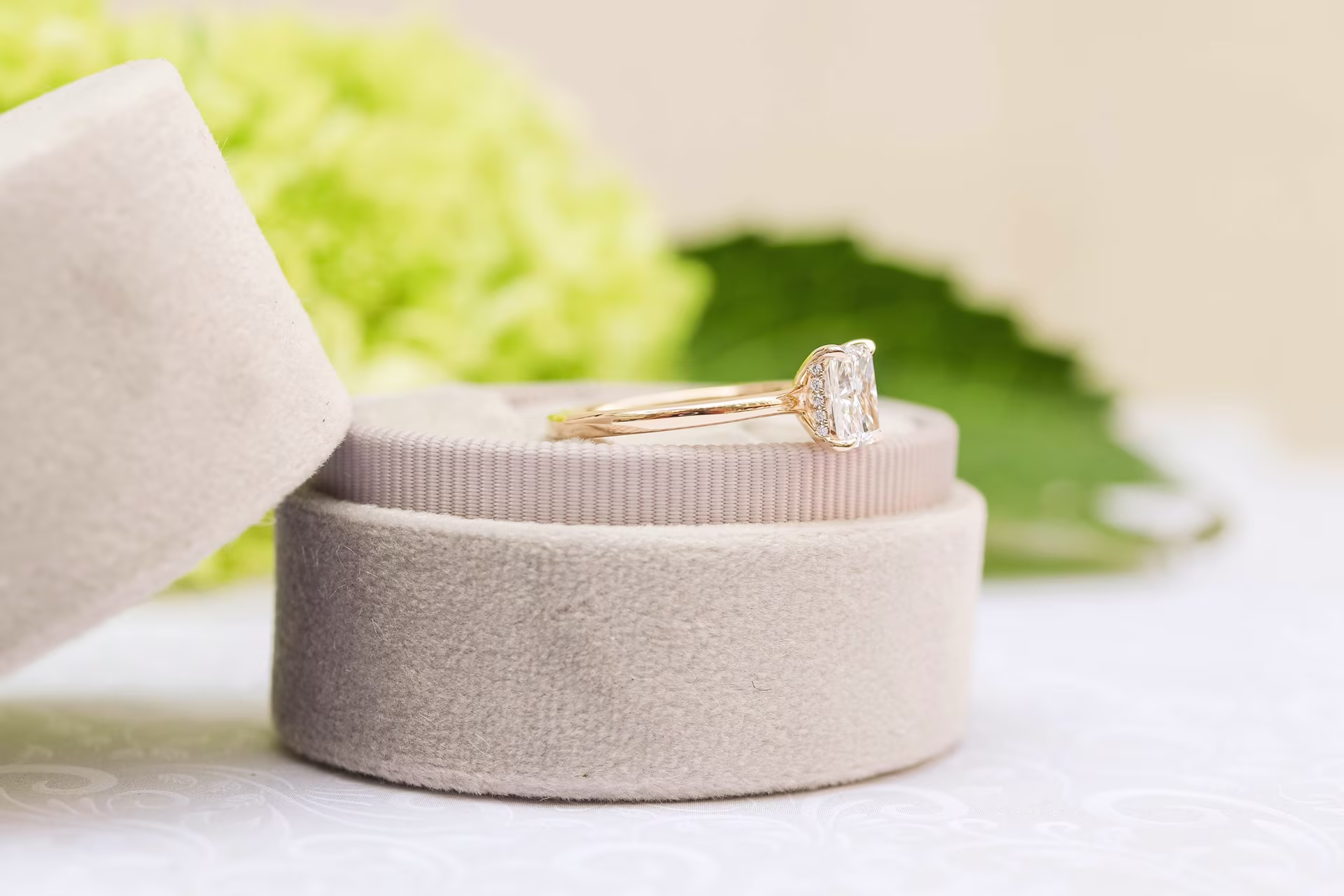 1.25ct radiant cut in solitaire with hidden halo