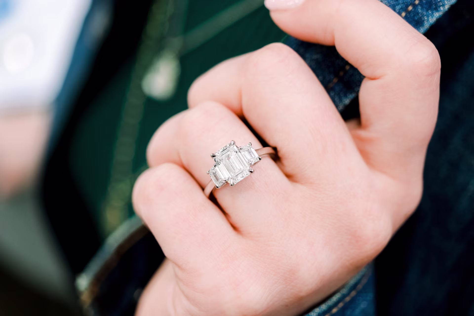 2.25ct emerald cut with side stones platinum