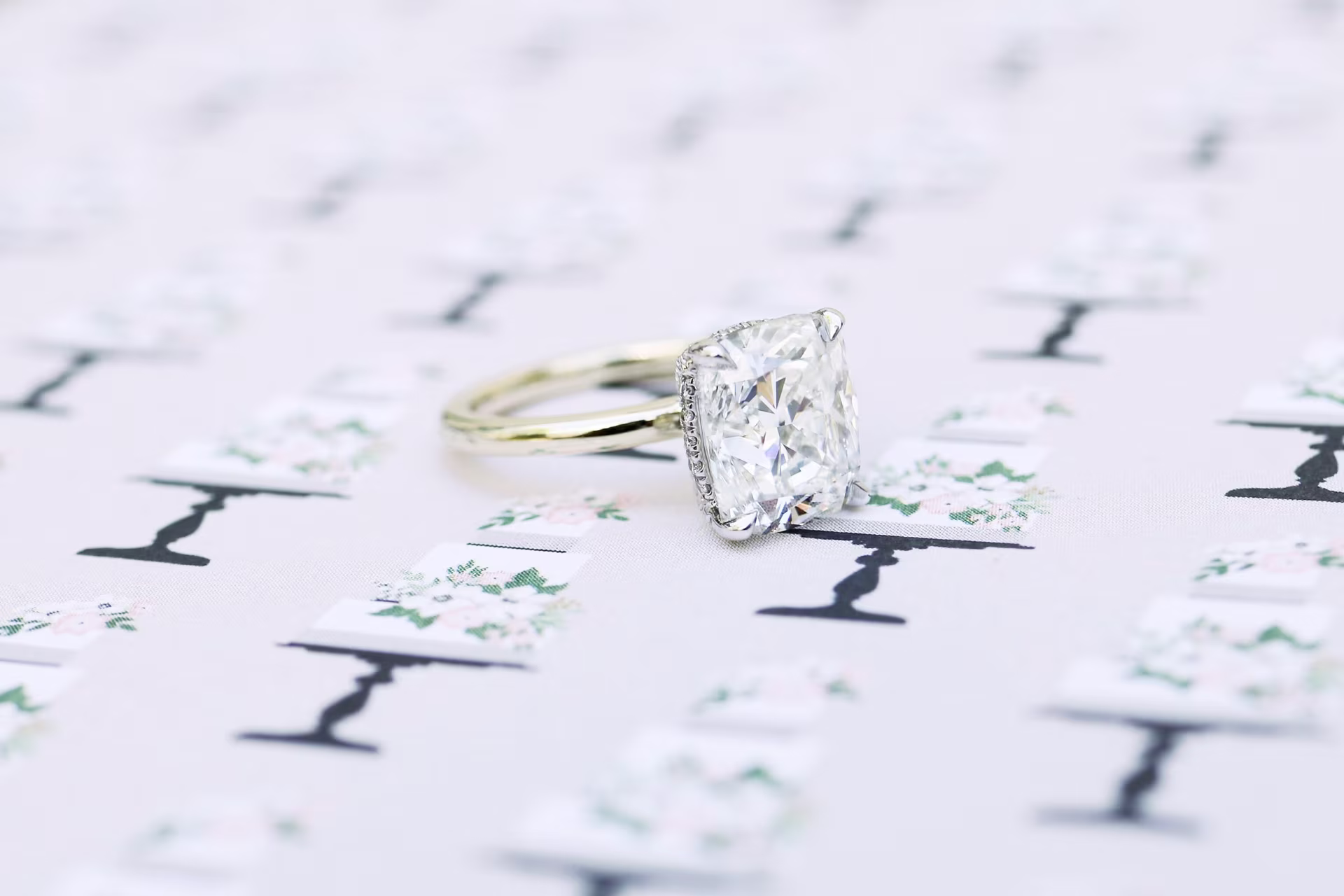 4ct cushion in petite solitaire