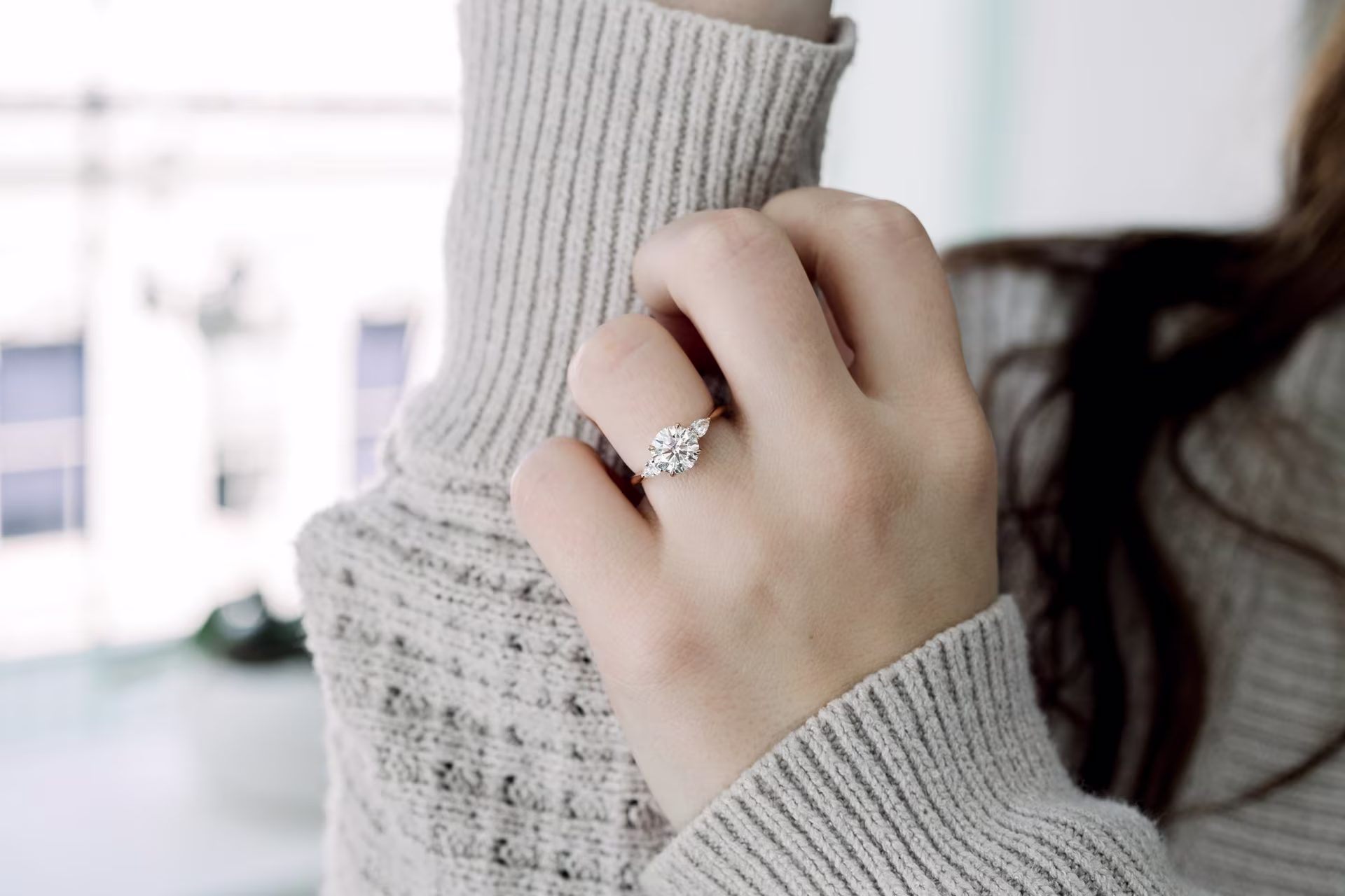 1.5ct round lab diamond engagement ring with pear side stones ada diamonds