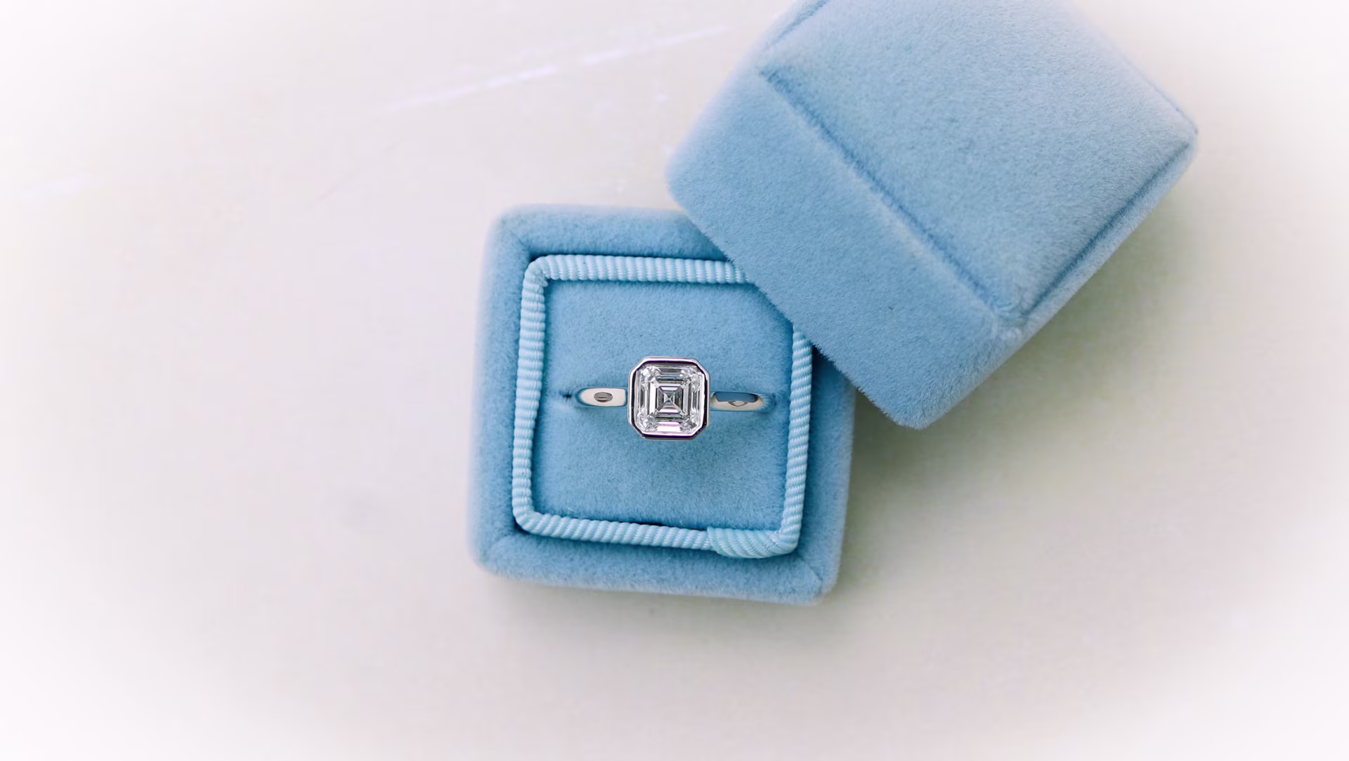 1.25ct asscher cut diamond bezel solitaire