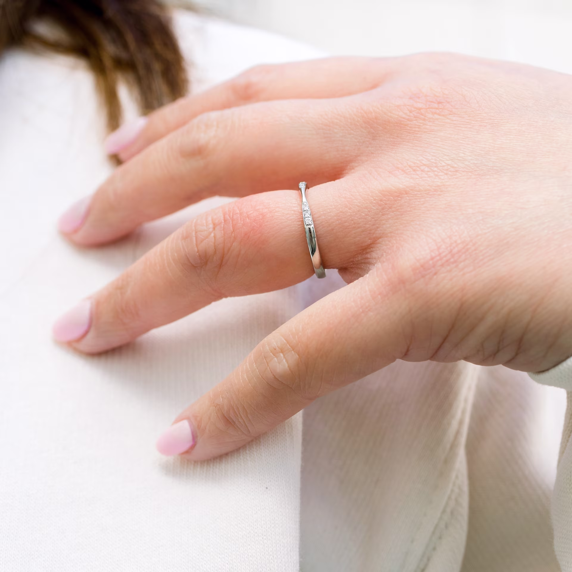 platinum channel set lab diamond wedding band with custom taper in center ada diamonds design ad 182 on model