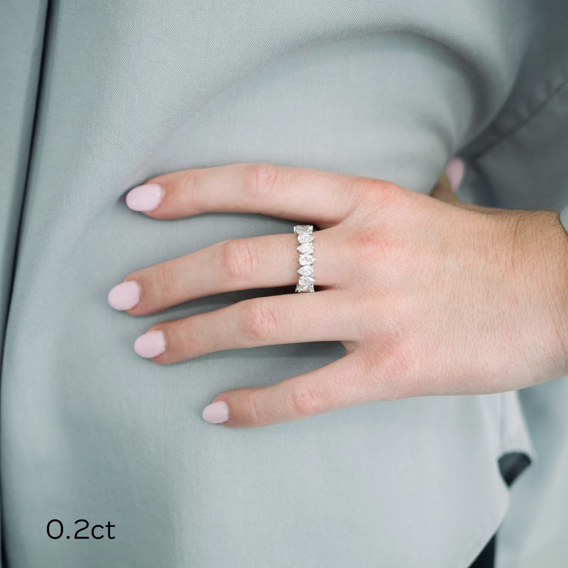 18k white gold pear eternity band featuring lab diamonds ada diamonds design ad 296 on model