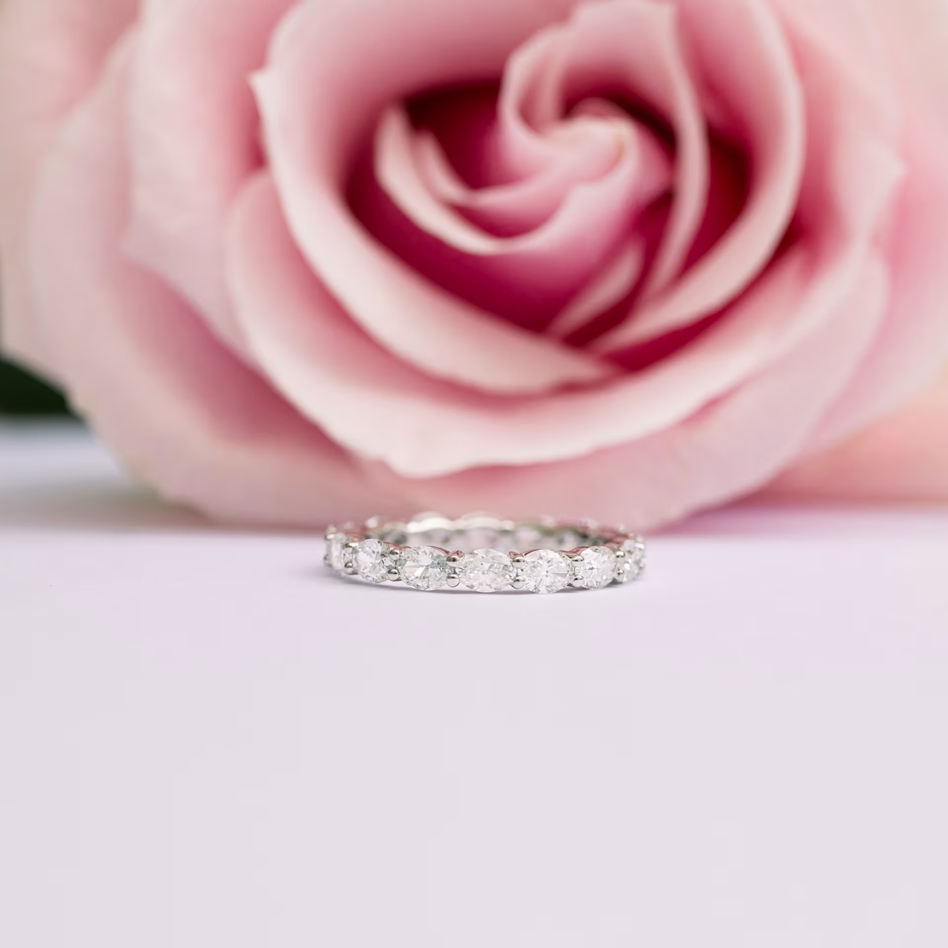 Platinum East-West 1.5ct Oval Lab Diamond Eternity Band Ada Diamonds Design AD-300 Floral Background