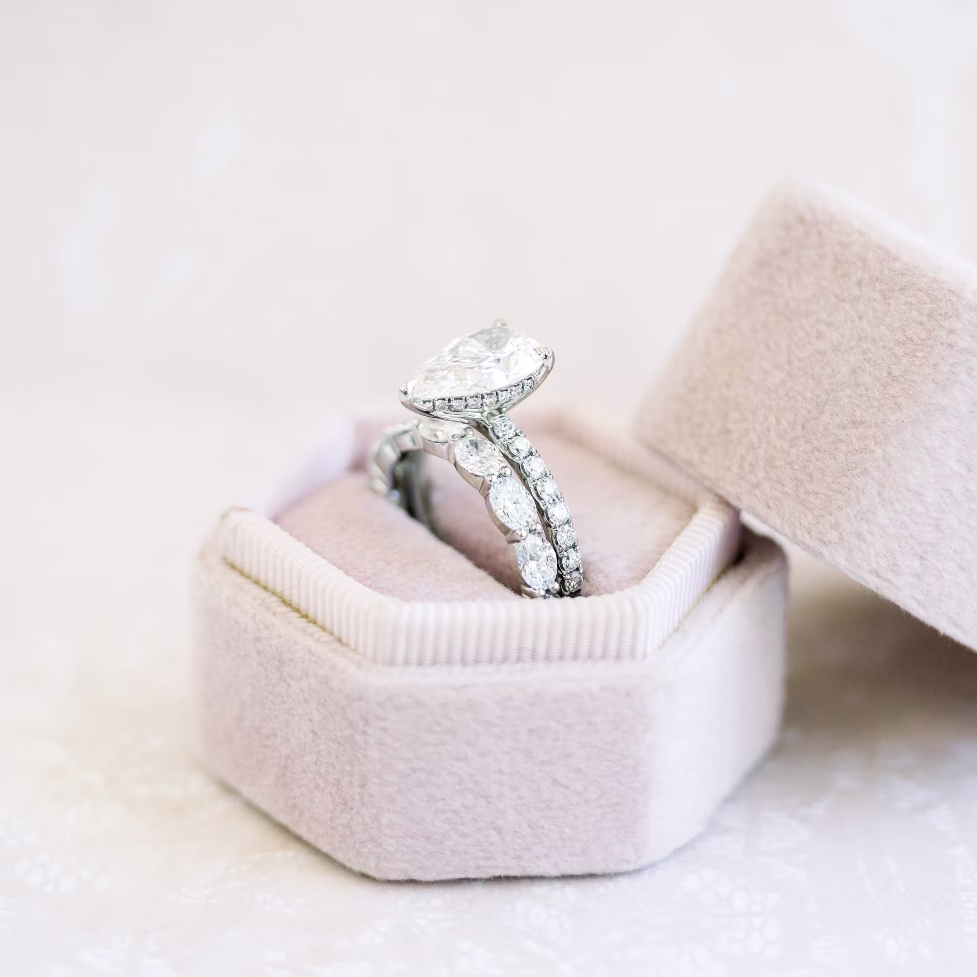 platinum 2ct pear pavé lab diamond engagement ring with east west oval lab diamond eternity band ada diamonds design ad 211 and ad 300