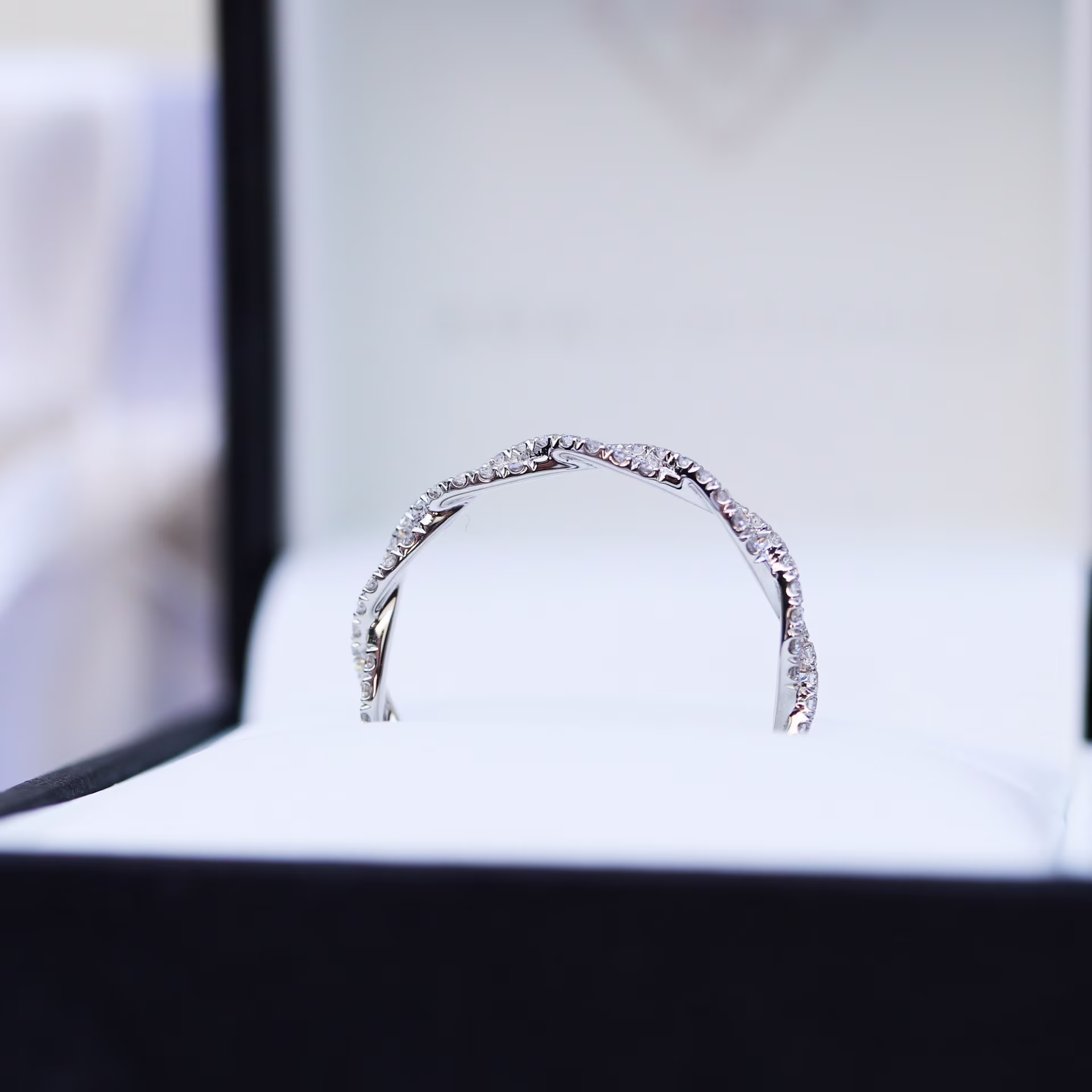 profile view half carat lab diamond twisting eternity band