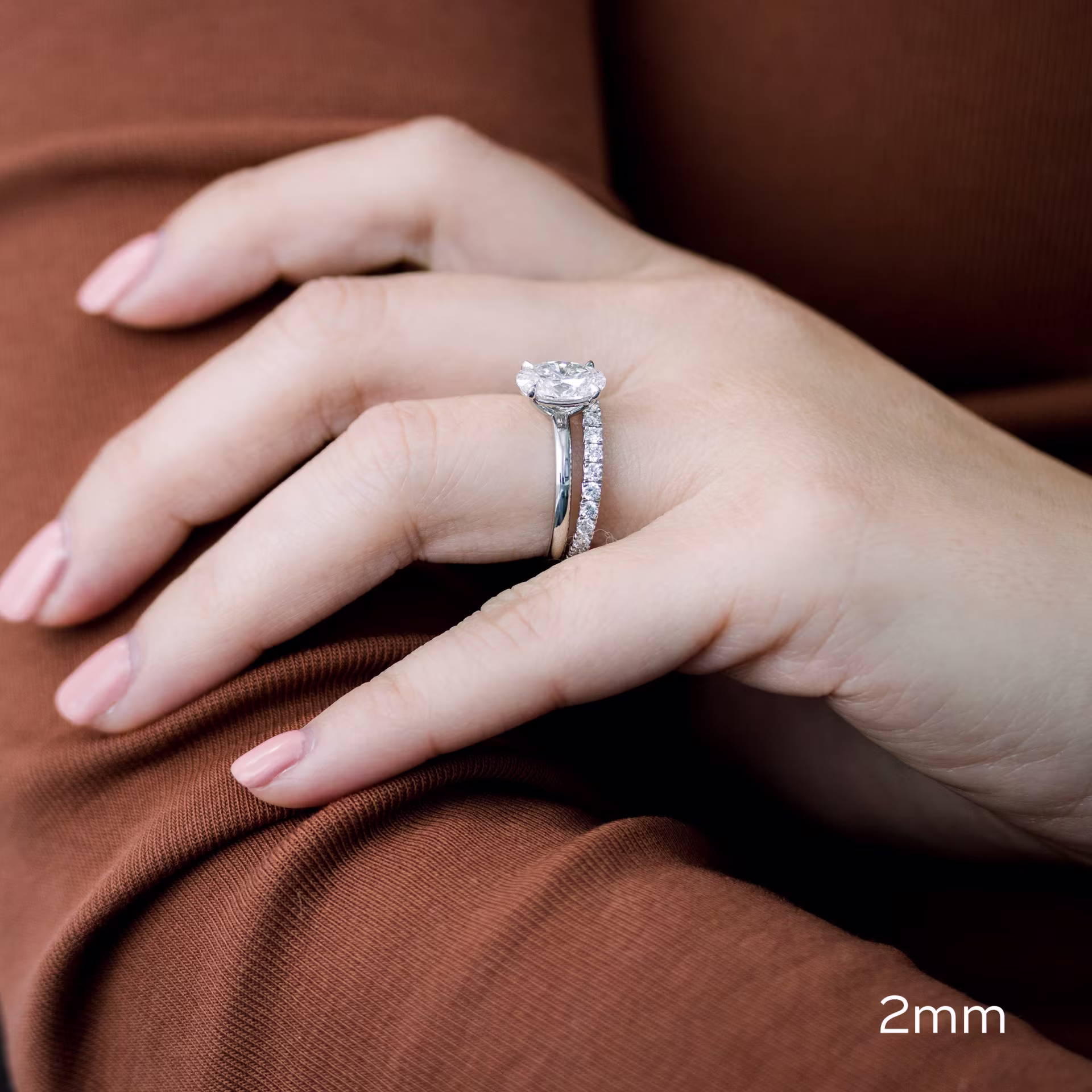 platinum lab diamond wedding set with oval solitaire and french pavé three quarter band ada diamonds design ad175 on model