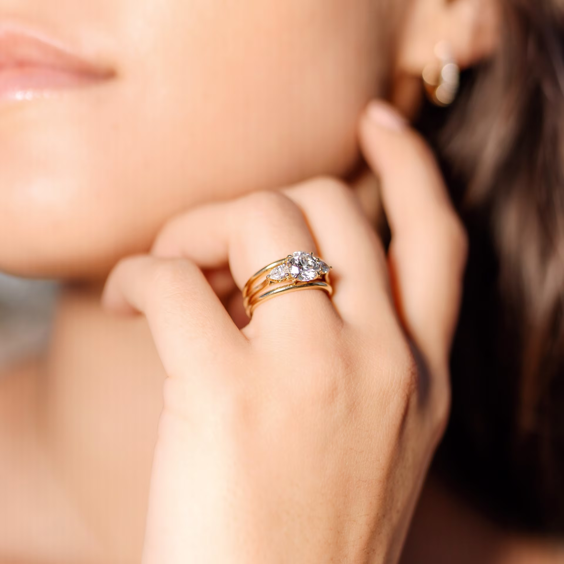 14k yellow gold lab diamond spacer bands with three stone engagement ring ada diamonds design ad 456 and ad195 on model