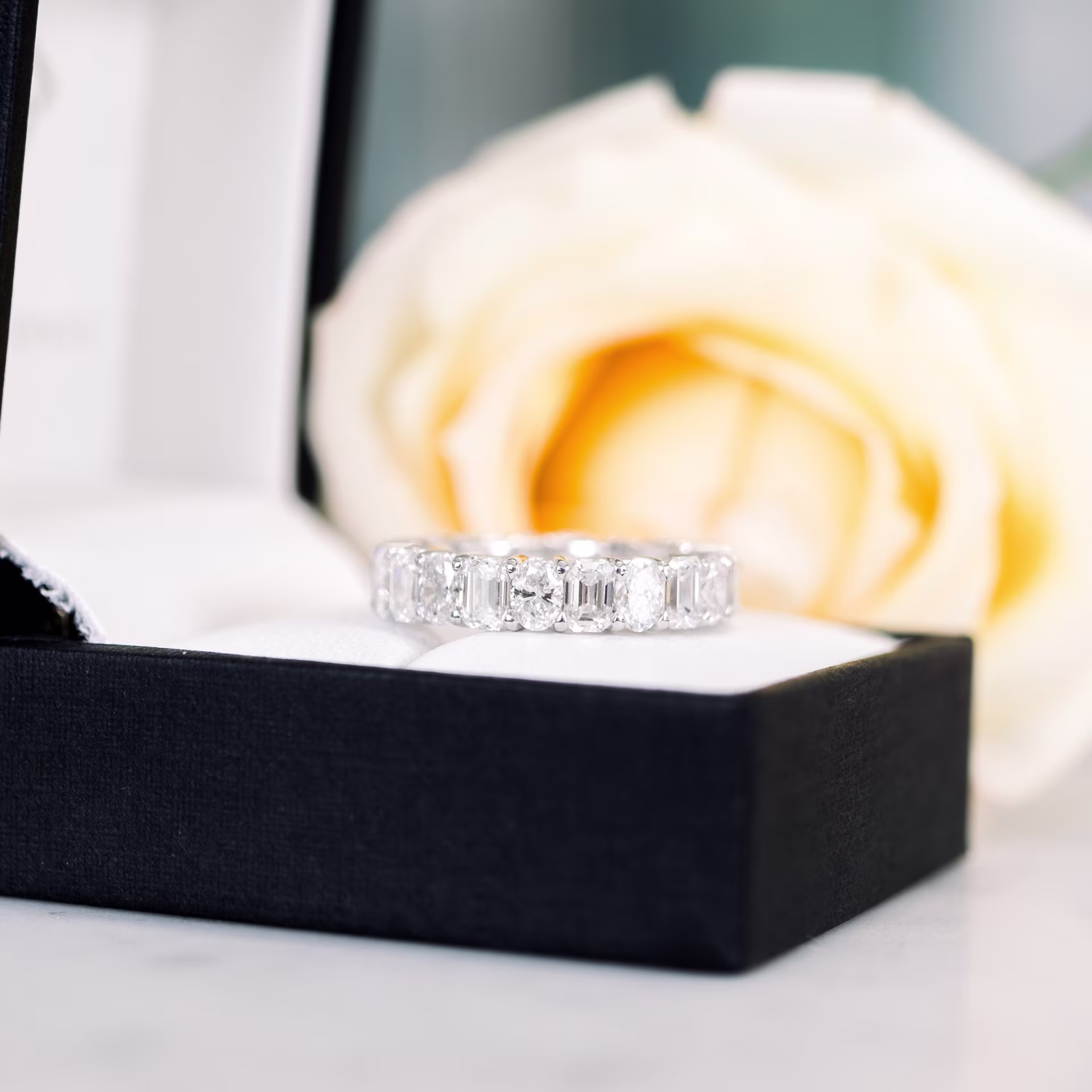 18k white gold custom oval and emerald man made diamond eternity band ada diamonds design ad 290 macro