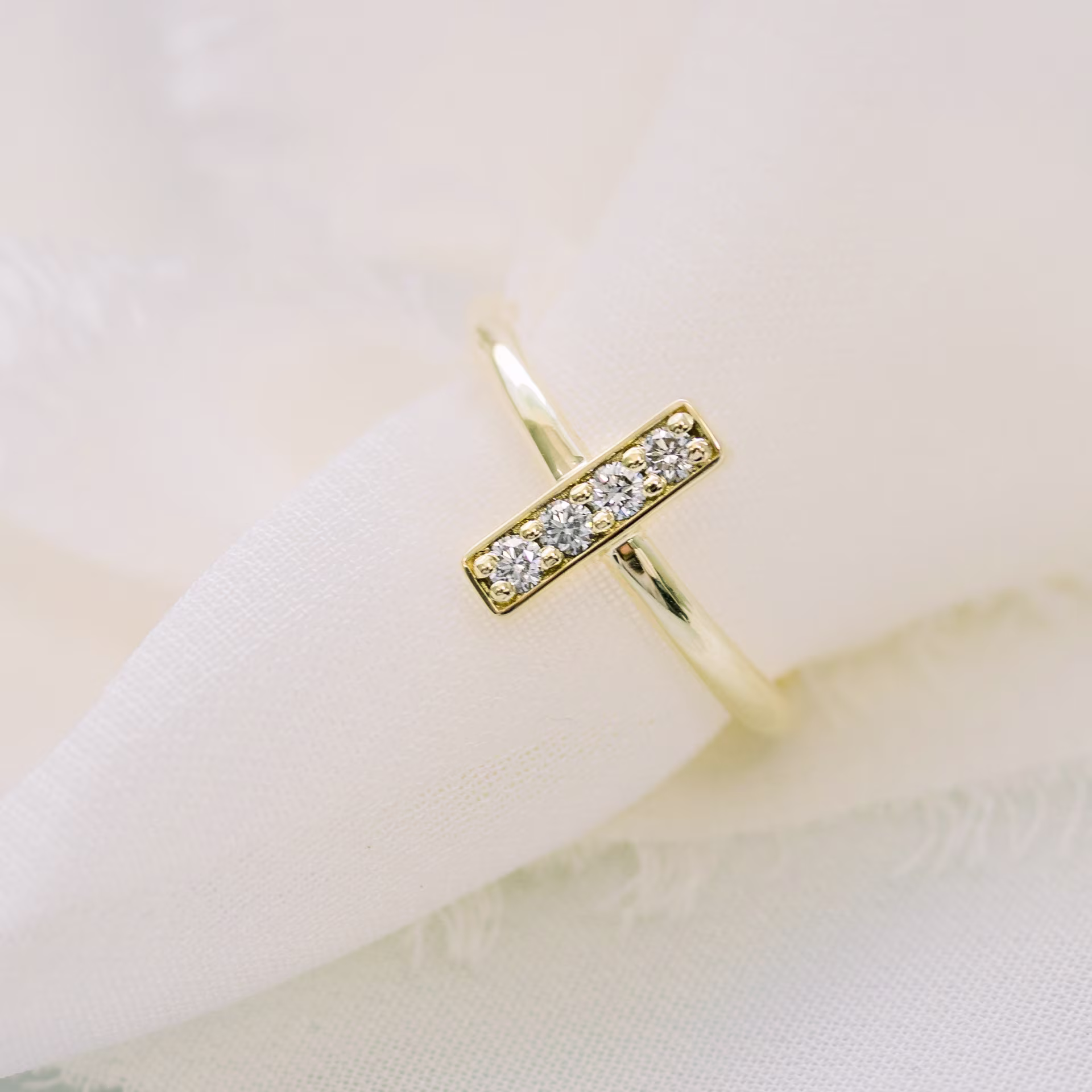 0.12 Carat Round Diamonds set in 14 Karat Yellow Gold Bar Ring (Main View)