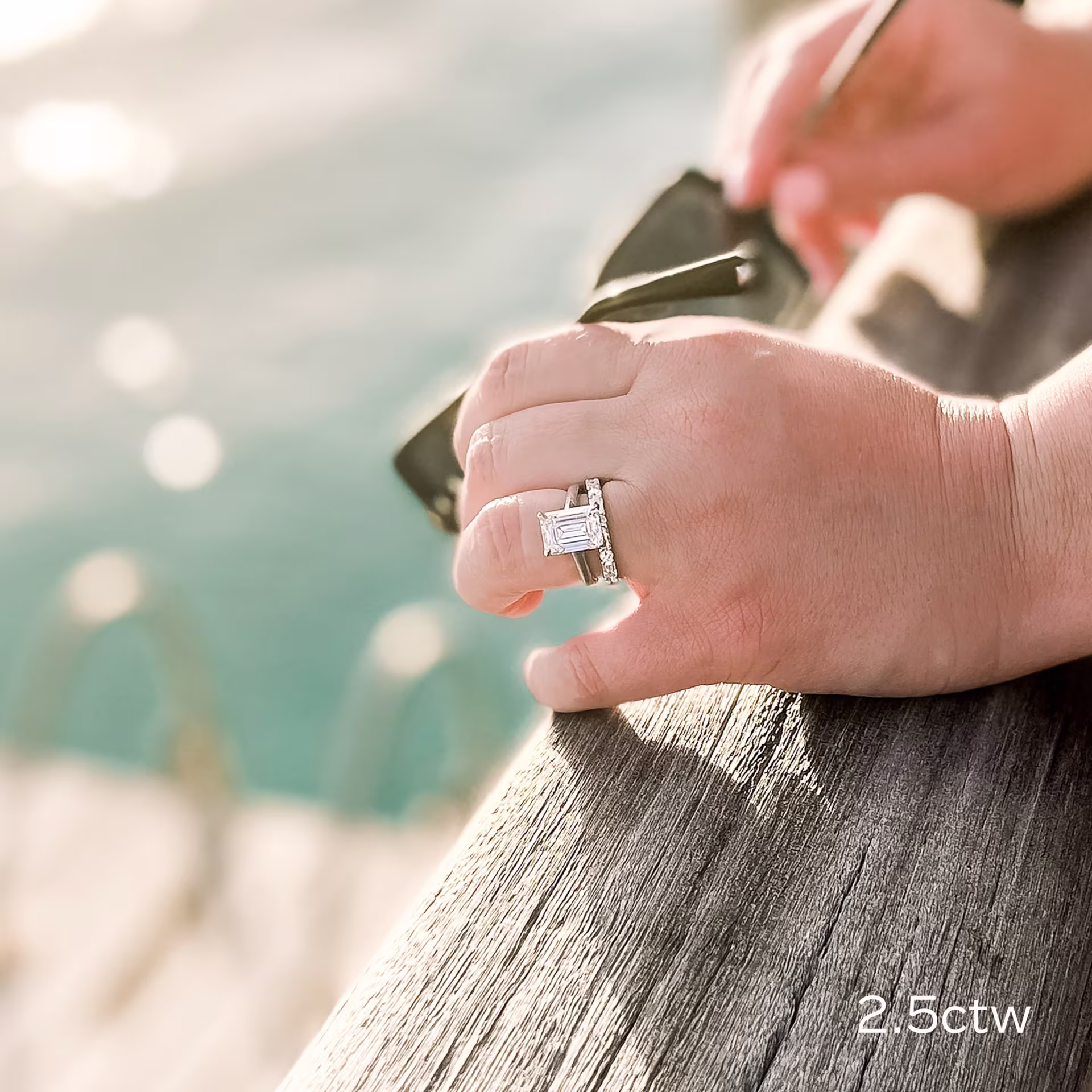 east west emerald and round eternity band in 18k white gold