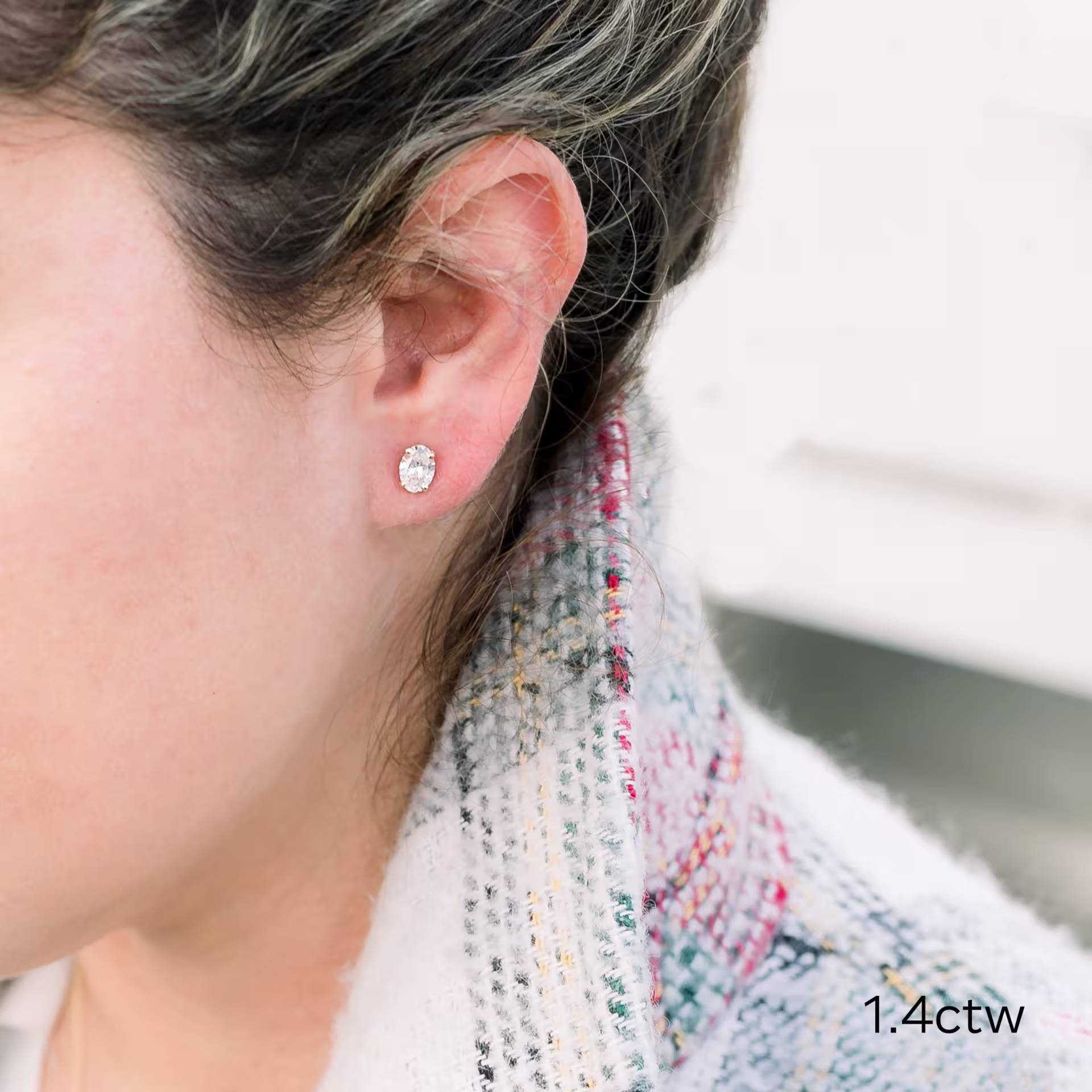 1.4 carat total weight yellow gold oval stud earrings made from lab grown diamonds Ada Diamonds ad 287 on model