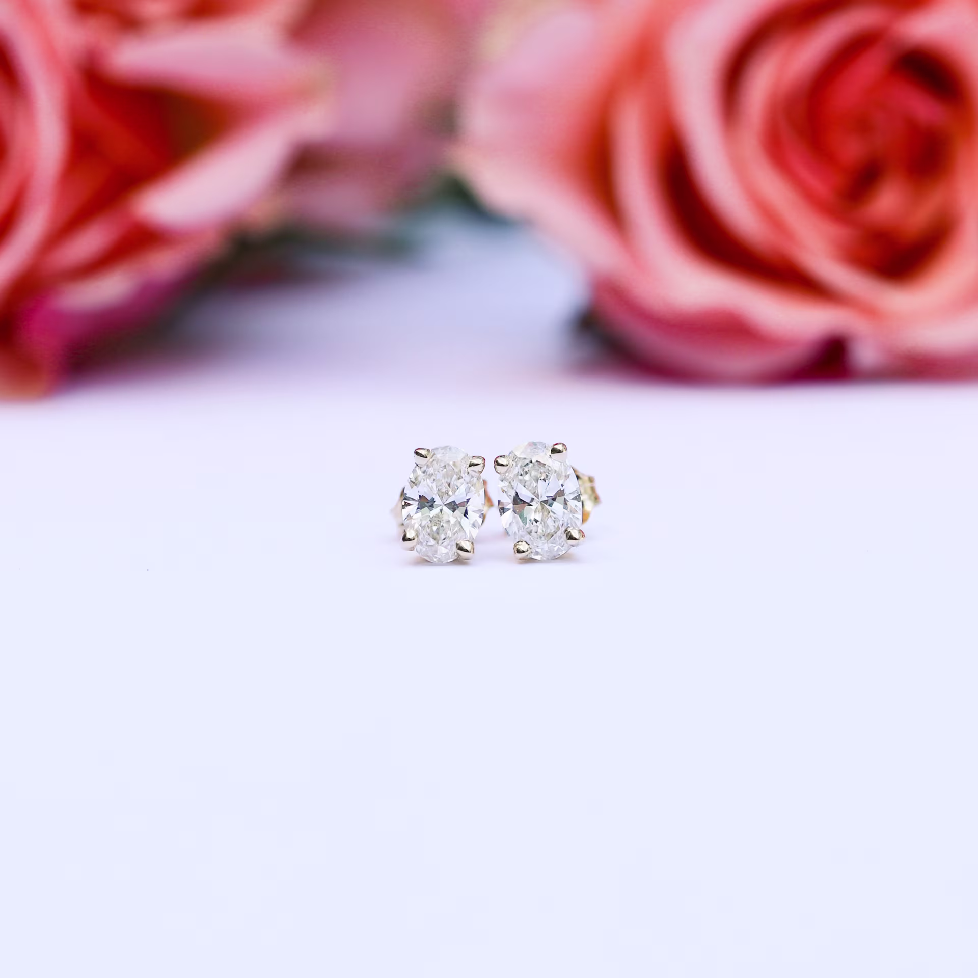 0.7 Carat Lab Created Diamonds set in 14k Yellow Gold Oval Stud Earrings (Main View)