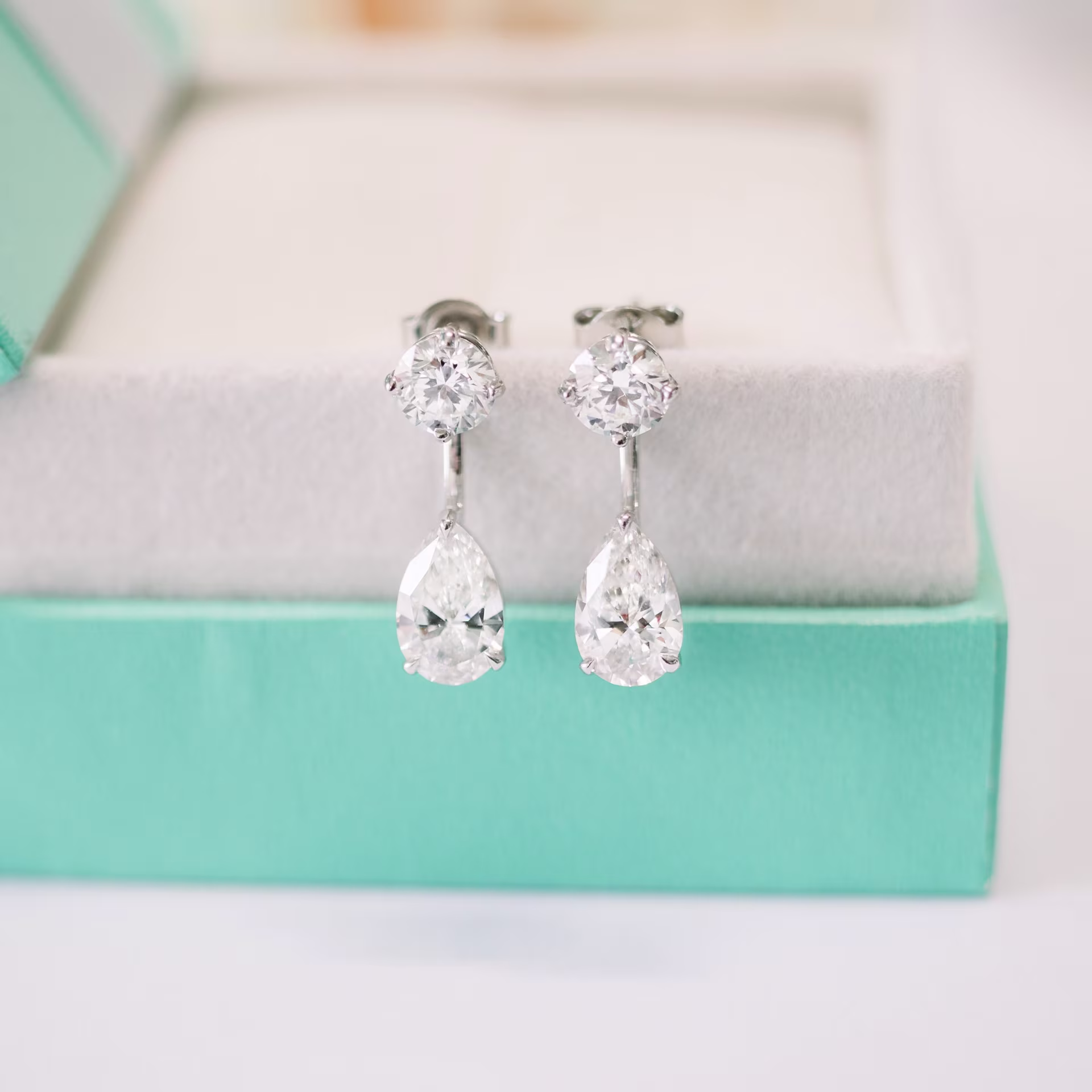 2ct pear earring jackets with round lab diamond studs 18k white gold ada diamonds
