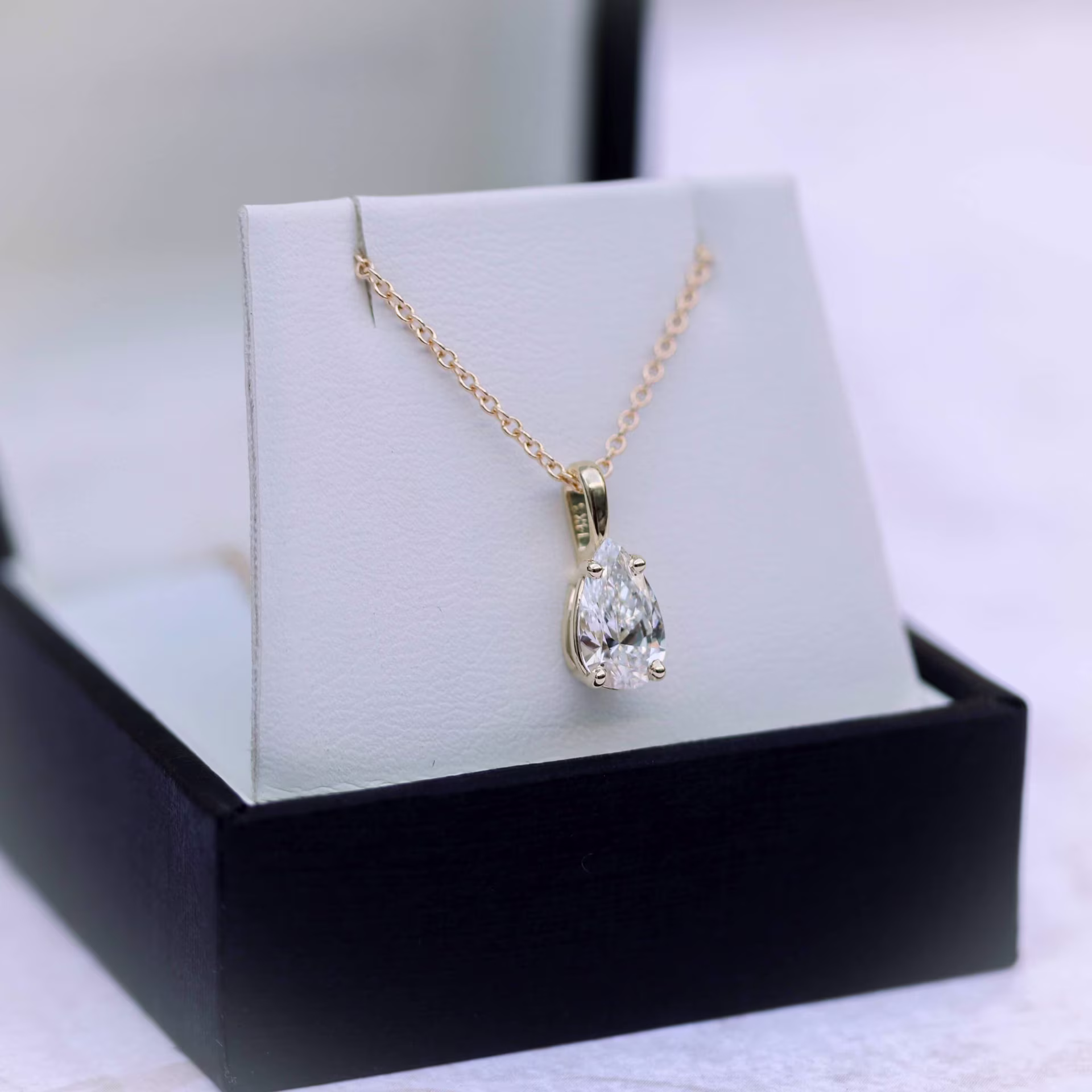 14k Yellow Gold Classic Pear Pendant featuring 0.7 Carat Lab Diamonds (Main View)