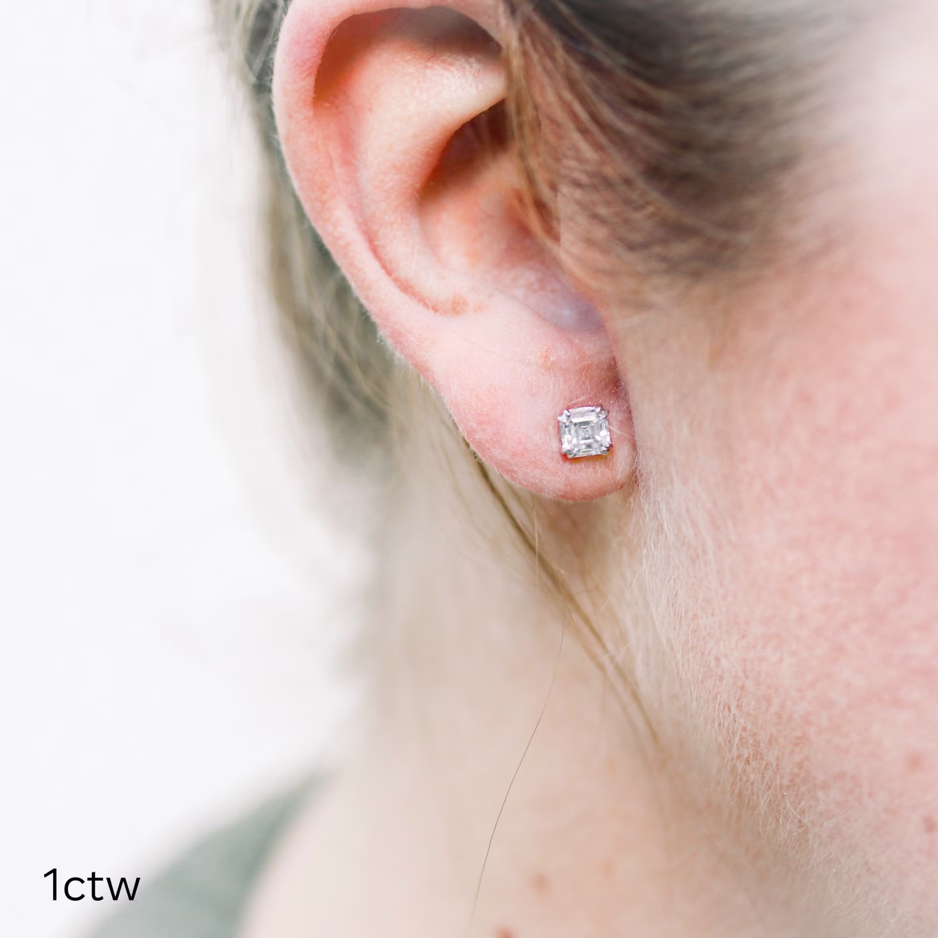 asscher cut stud earrings in white gold platinum metal made with man made diamonds ADA Diamonds ad design 288