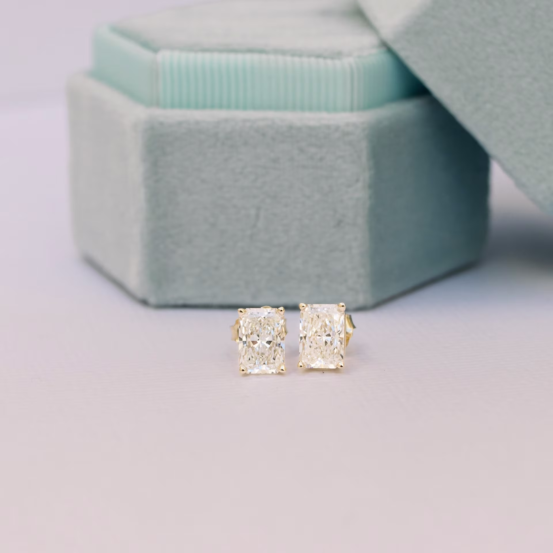High Quality 2.0 Carat Lab Created Diamonds set in 14k Yellow Gold Radiant Stud Earrings (Main View)