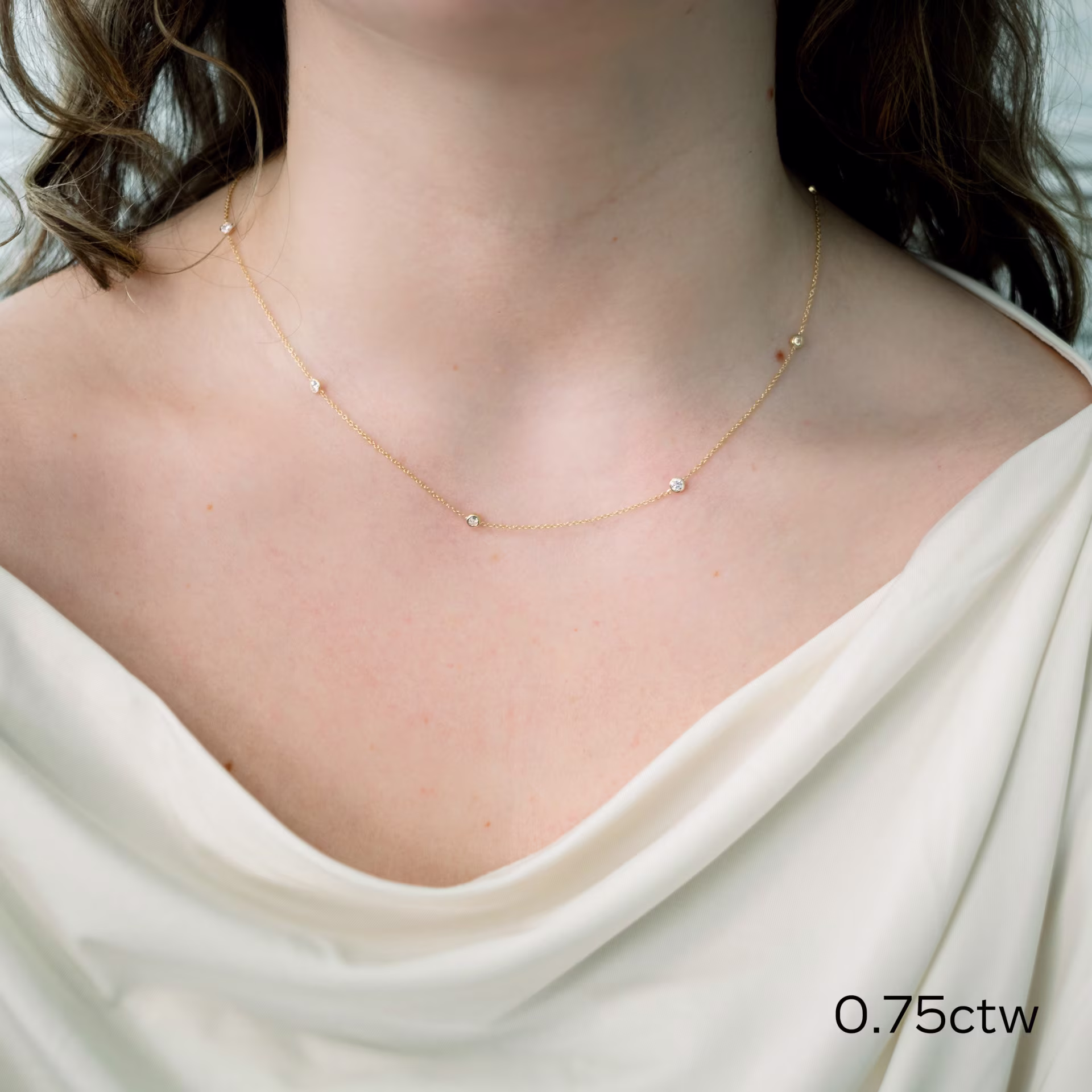 18k yellow gold round diamonds by the yard seven stone manmade diamond necklace ada diamonds design ad 228 on model