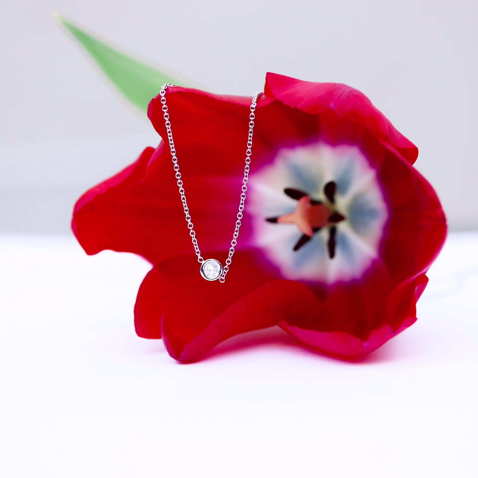 Single Bezel Floating Cosmopolitan diamond necklace made with laboratory diamonds ADA Diamonds design 039