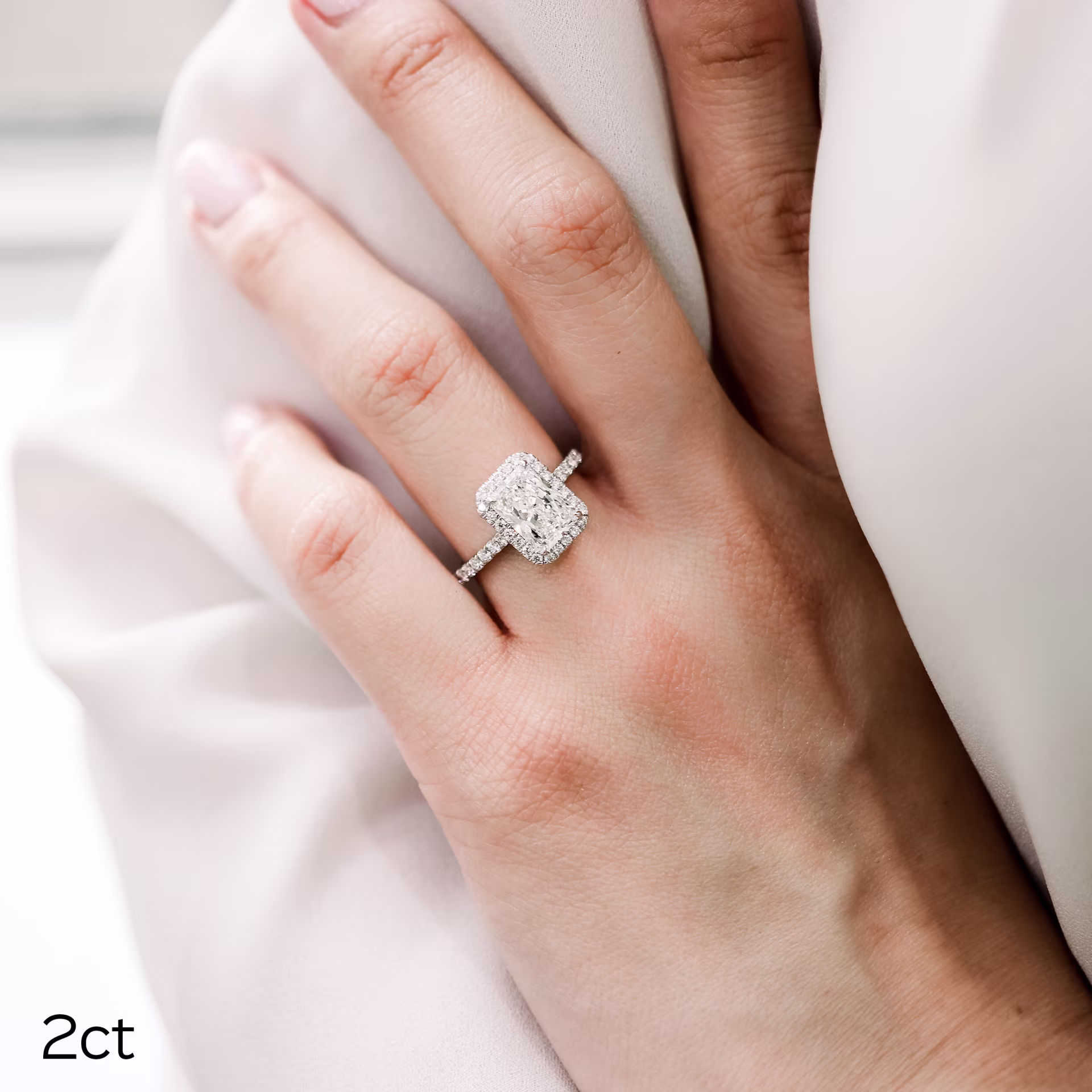 3 Carat Radiant Cut Lab Grown Diamond Ring with Halo and Diamond Band Ada Diamonds Design AD-445 on Model