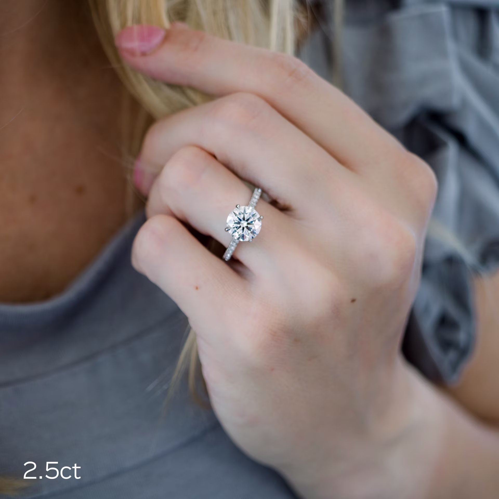 2 and a half carat lab diamond in a pave setting