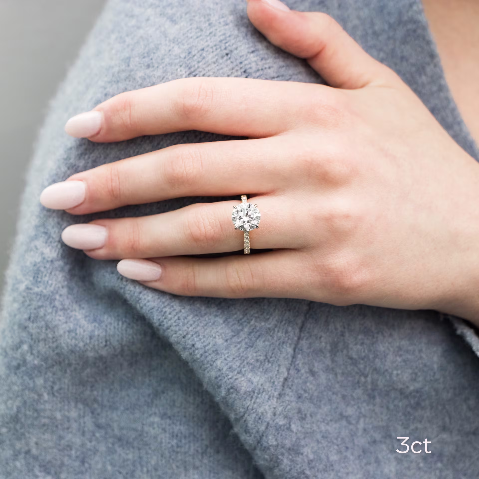 two tone platinum and yellow gold 3 ct round high profile engagement ring with diamond band ada diamonds design ad 133 on model