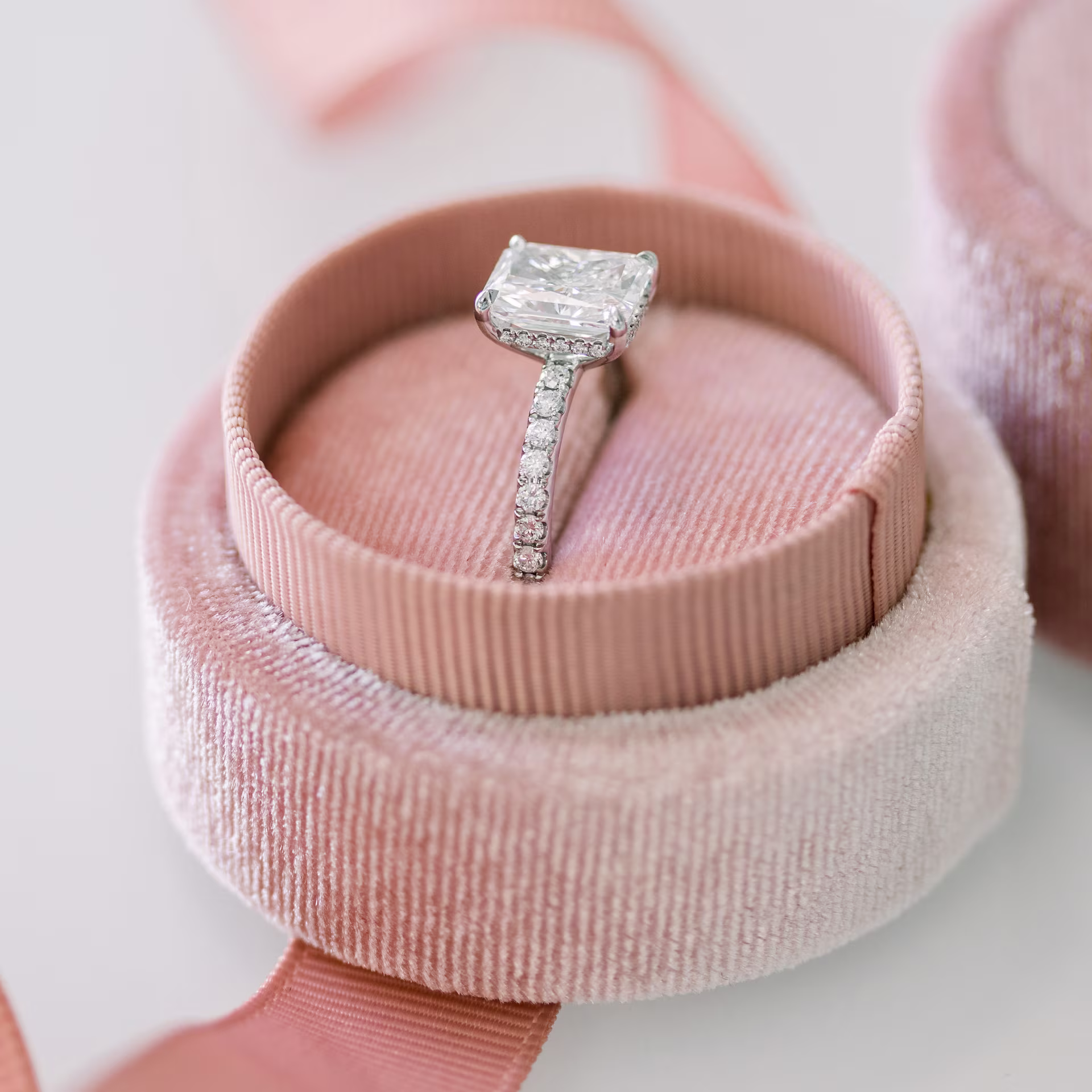 white gold radiant cut with hidden halo in petite pave